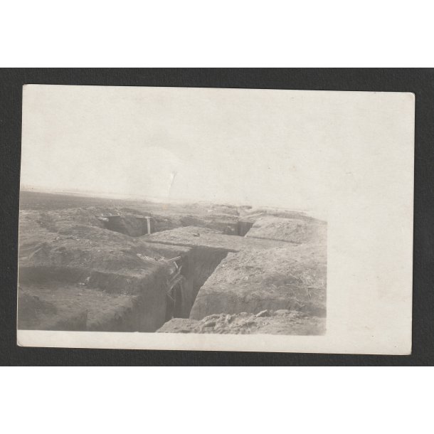 German WWI feldpost postcard - Stormed Russian trenches