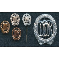 East German DDR Sports Badge in Silver + miniatures