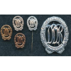 East German DDR Sports Badge in Silver + miniatures