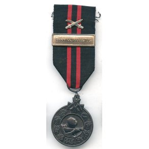 Finnish WW2 Winter war medal with swords for combatants 'RANNIKKOPUOLUSTUS'