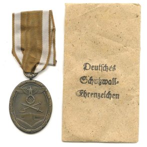 German WW2 Westwall medal with bag of issue 'Carl Poellath'