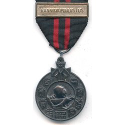 Finnish WW2 Winter war medal with swords for combatants 'RANNIKKOPUOLUSTUS'