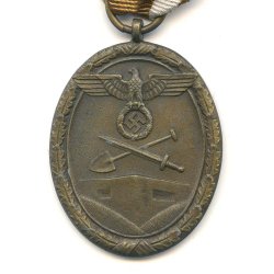 German WW2 Westwall medal with bag of issue 'Carl Poellath'
