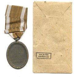 German WW2 Westwall medal with bag of issue 'Carl Poellath'