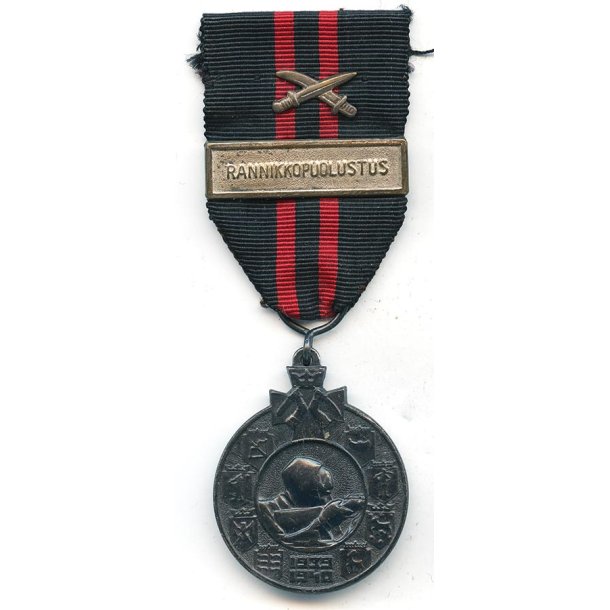 Finnish WW2 Winter war medal with swords for combatants 'RANNIKKOPUOLUSTUS'
